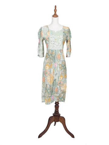 Light Green Kurti Adorned with Floral Prints and Thread work - Diadem