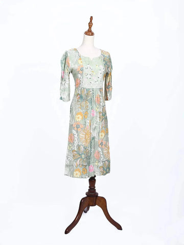 Light Green Kurti Adorned with Floral Prints and Thread work - Diadem