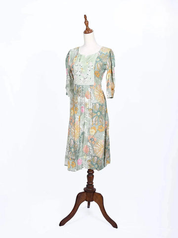 Light Green Kurti Adorned with Floral Prints and Thread work - Diadem