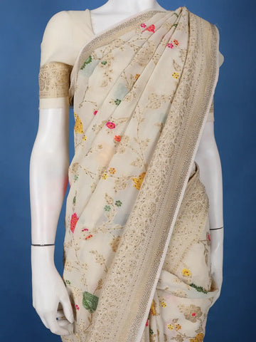 Cream Floral Embroidered Synthetic Saree With Zari Border - Diadem