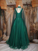 Emerald Green Sequins Embroidered Design Net Gown With Sheer Cape Sleeves
