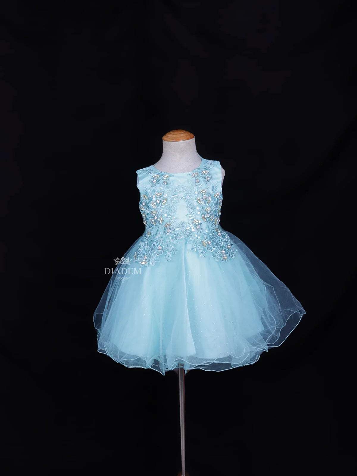 Aqua Blue Net Frock Adorned with Floral Laces and Pearl Beads - Diadem