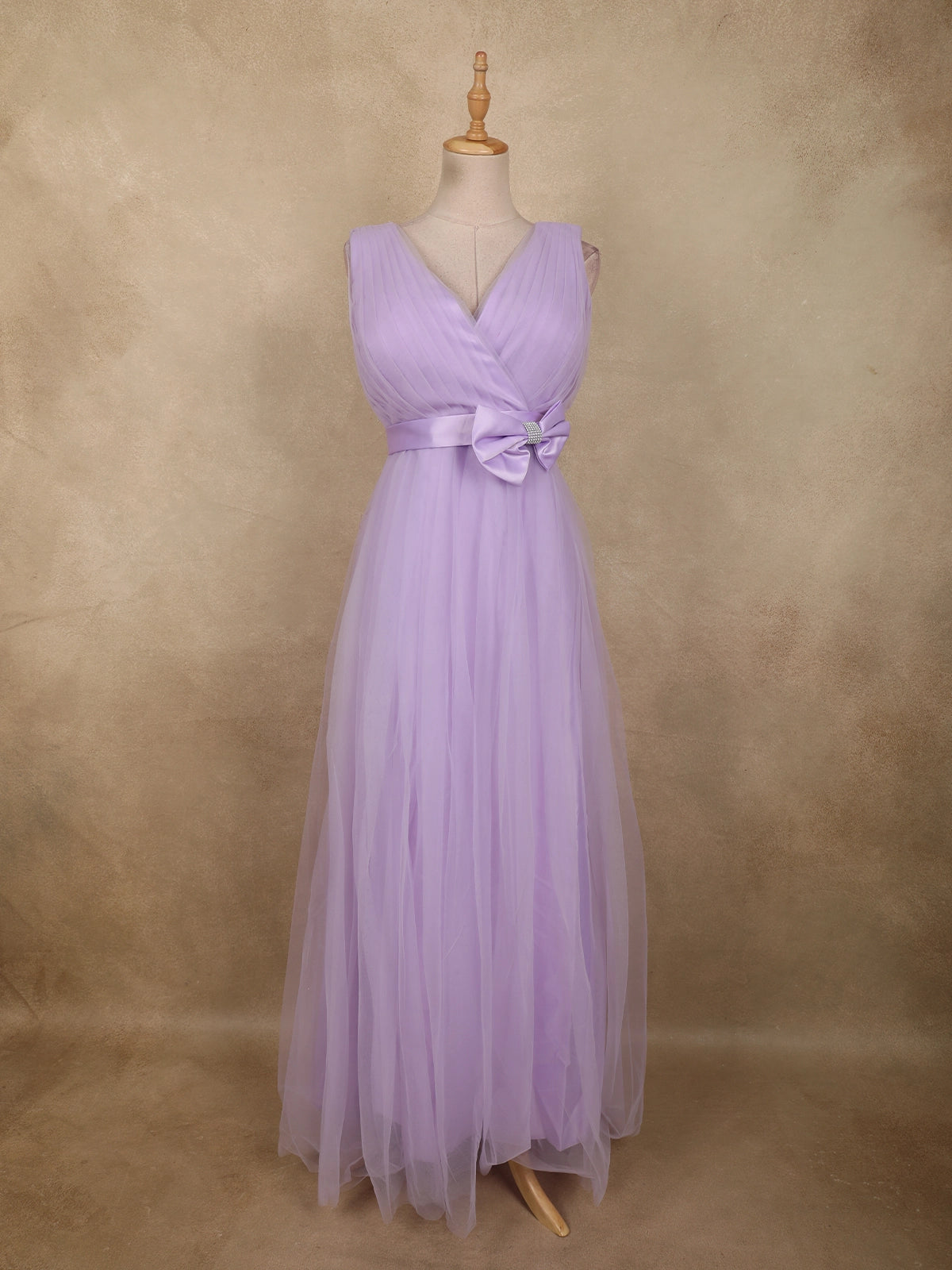 Light Lavender Pleated Design with Bow Embellishment Net Party Wear Gown