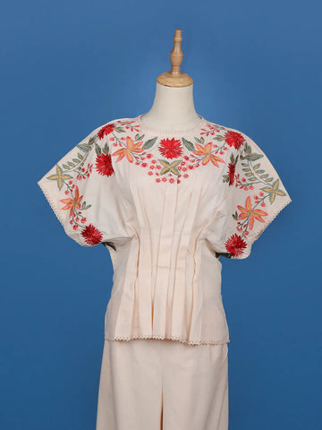 Light Peach Floral Designed Net Salwar Suit - Diadem