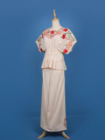 Light Peach Floral Designed Net Salwar Suit - Diadem