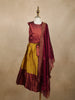 Maroon And Mustard Yellow Zari Woven Raw Silk Pattu Pavadai With Dupatta