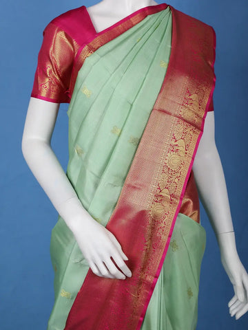 Mint Green Floral Design Zari Woven Silk Saree - Diadem