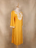 Mustard Yellow Floral Embroidered Design Cotton Kurti