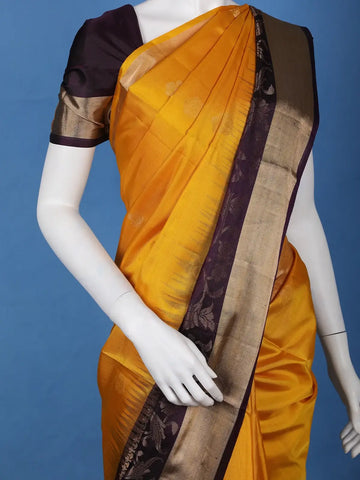 Mustard Yellow Solid Design Gold Zari Woven Soft Silk Saree - Diadem