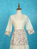 Ivory with Maroon Cotton Kurti Adorned with Floral Thread Work and Sequins - Diadem