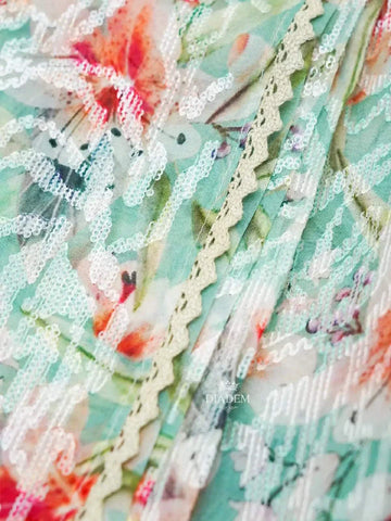 Mint Green Organza Silk Saree Adorned in Floral Prints and Sequins - Diadem