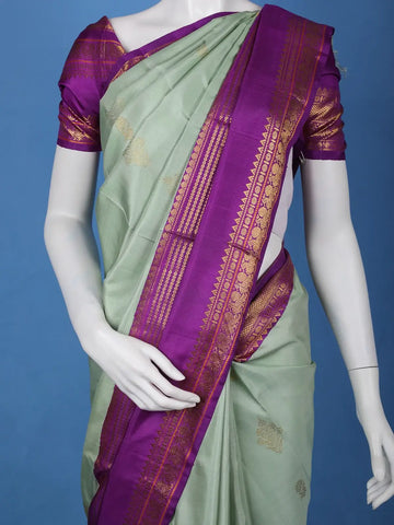 Pastel Green Floral Design With Purple Zari Woven Soft Silk Saree - Diadem