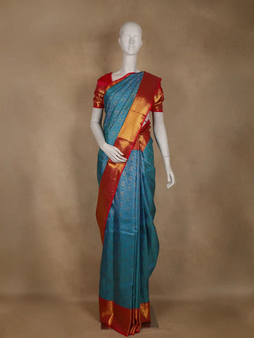 Peacock Blue Floral Woven Pure Kanchipuram Silk Saree With Contrast Border - Diadem