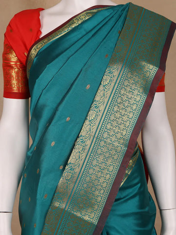 Peacock Green Butta Design Zari Weaving Soft Silk Saree - Diadem