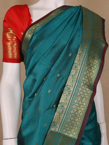 Peacock Green Butta Design Zari Weaving Soft Silk Saree - Diadem