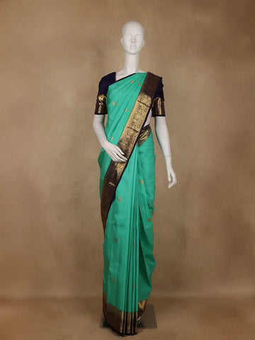 Sea Green Butta Woven Pure Kanchipuram Silk Saree With Navy Blue Zari Border - Diadem