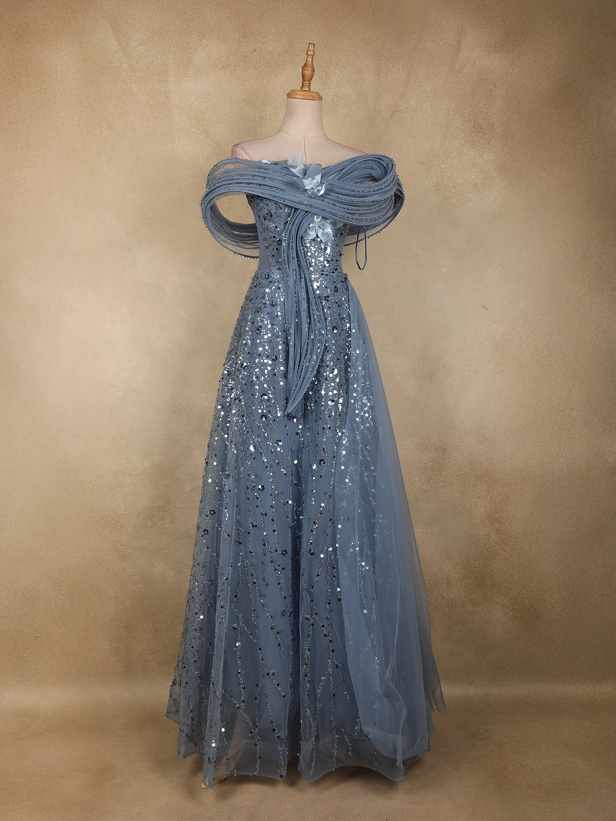 Steel Blue Heavy Sequins Embroidered Design Off-Shoulder Net Party Wear Gown | Diadem Steel Blue Heavy Sequins Embroidered Design Off-Shoulder Net Party Wear Gown | Diadem