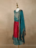 Teal Blue And Dark Pink Floral Zari Woven Raw Silk Pattu Pavadai With Dupatta