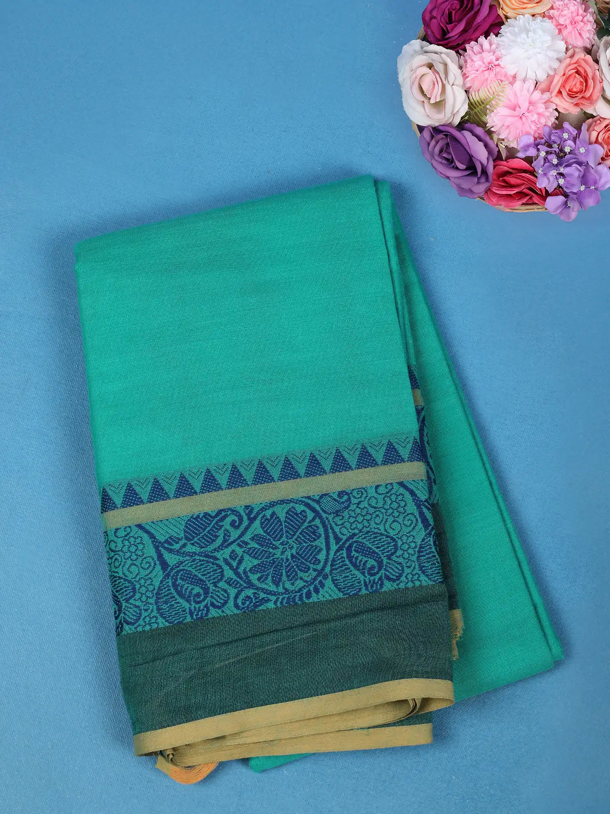 Teal Green Solid Cotton Saree With Blue Floral Design Border - Diadem