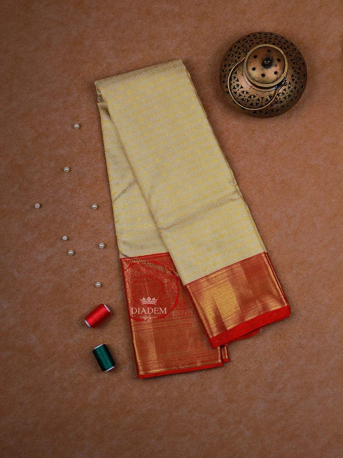 Cream Pure Kanchipuram Silk Saree with Geometric Design on the Body with Contrast Broad and Small Zari Border - Diadem