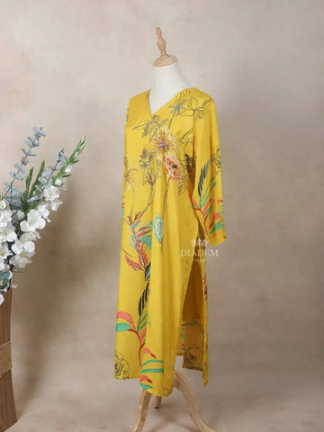 Yellow Crepe Kurti Top Adorned with Sequins and Floral Prints - Diadem