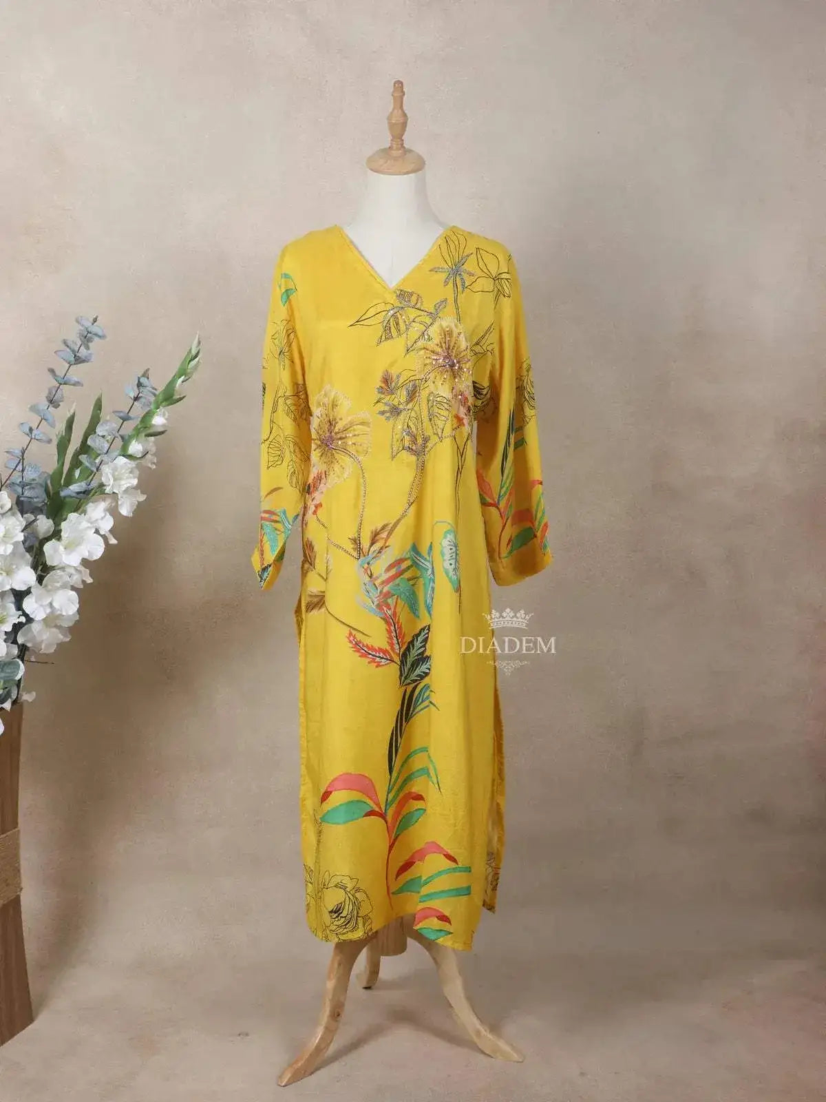 Yellow Crepe Kurti Top Adorned with Sequins and Floral Prints - Diadem