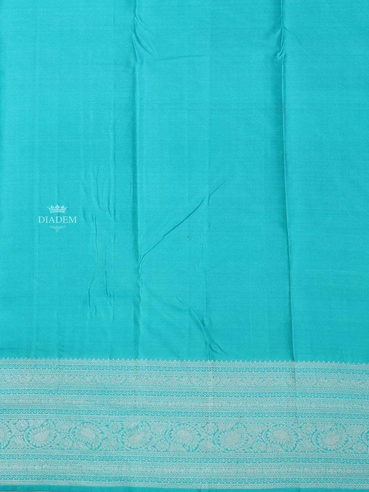 Turquoise Blue Pure Kanchipuram Bridal Silk Saree with Paisley Motif on the Body with Zari Border - Diadem