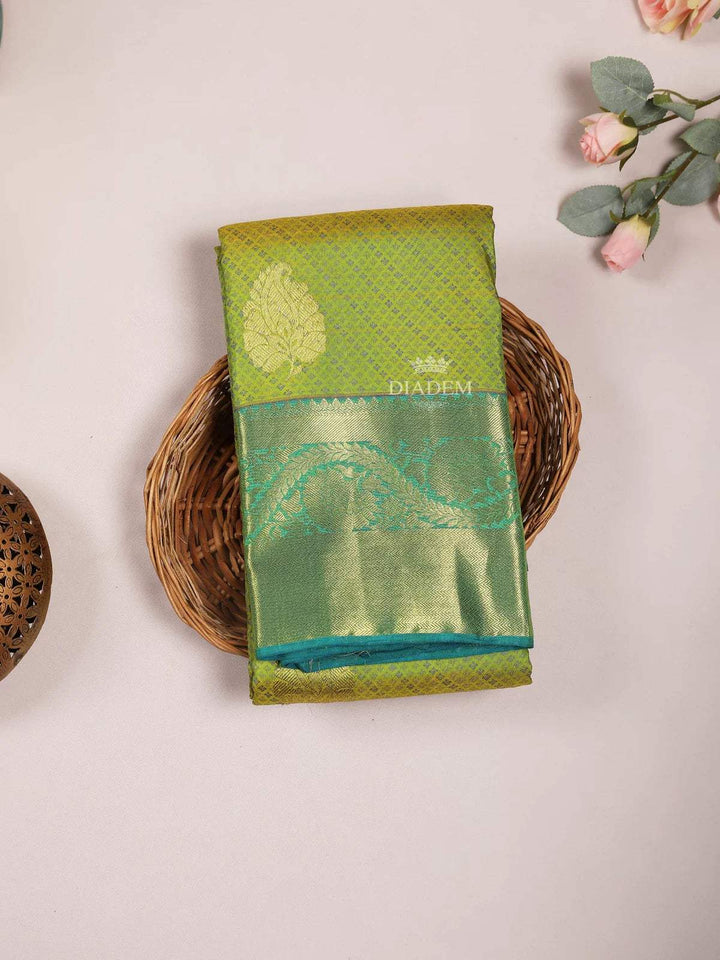 Parrot Green Pure Kanchipuram Bridal Silk Saree with Leaf Motif on the body and Contrast Zari Border - Diadem