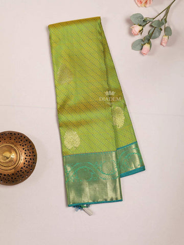 Parrot Green Pure Kanchipuram Bridal Silk Saree with Leaf Motif on the body and Contrast Zari Border - Diadem