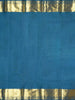 Peacock Blue Pure Kanchipuram Silk Saree with Small Floral buttas on the Body and with Matching Border