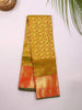 Olive Green Kanchipuram Bridal Silk Saree with Floral Motif and Zari Border