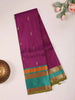 Purple Pure Kanchipuram Bridal Silk Saree with Paisley Motif on the body and Contrast Zari Border