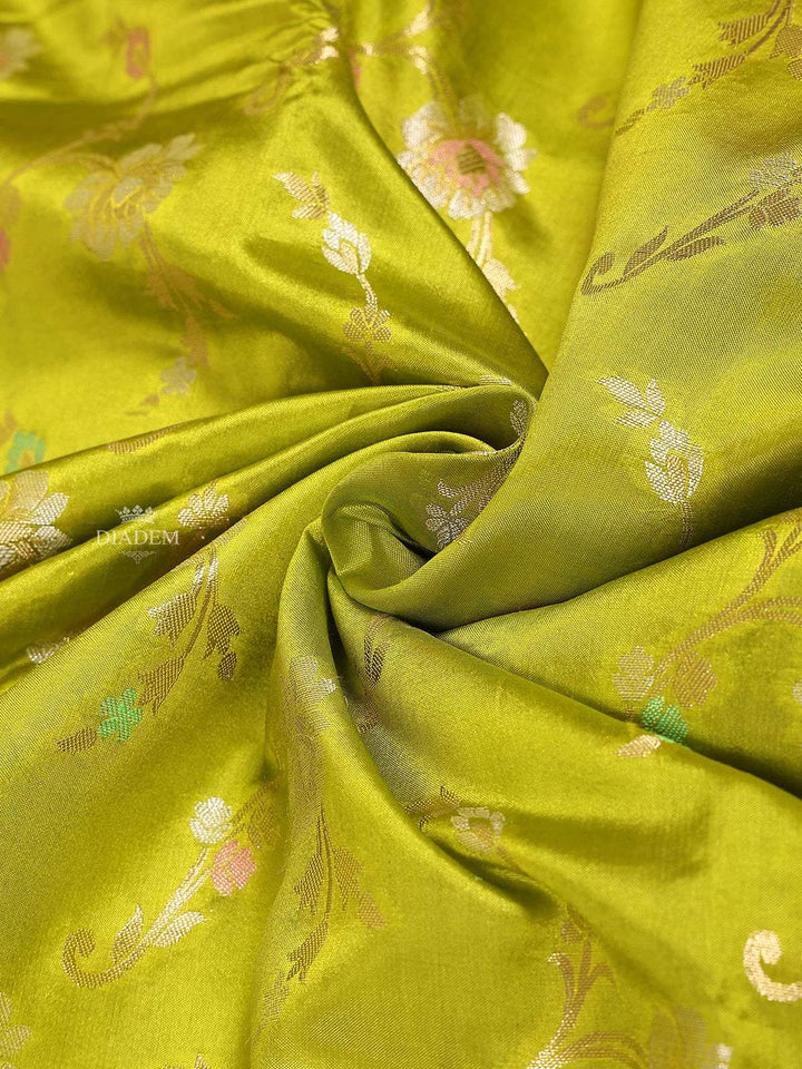 Green Banarasi Saree with Flower Design on the Body with Contrast Zari Border - Diadem
