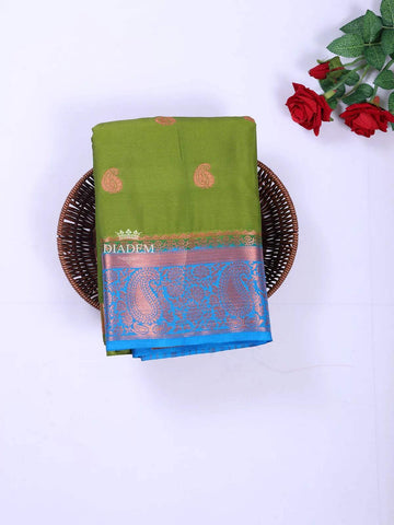 Olive Green Art Silk Saree with Paisley Motif on the body and Contrast Zari Border - Diadem