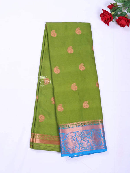 Olive Green Art Silk Saree with Paisley Motif on the body and Contrast Zari Border - Diadem