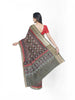 Olive Green Semi Tussar Silk Saree with Patola Prints on the body and Contrast Zari Border