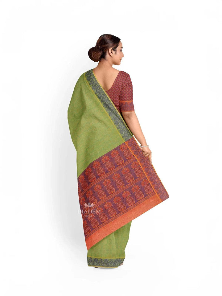 Green Cotton Saree with Paisley Motif on the body and Thread Border - Diadem