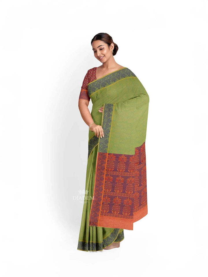 Green Cotton Saree with Paisley Motif on the body and Thread Border - Diadem