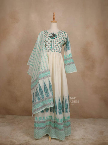 Off White Cotton Straight Cut Salwar Suit for Women Adorned with Sequins and Flower Designs Paired with Dupatta - Diadem