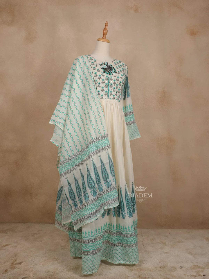 Off White Cotton Straight Cut Salwar Suit for Women Adorned with Sequins and Flower Designs Paired with Dupatta - Diadem