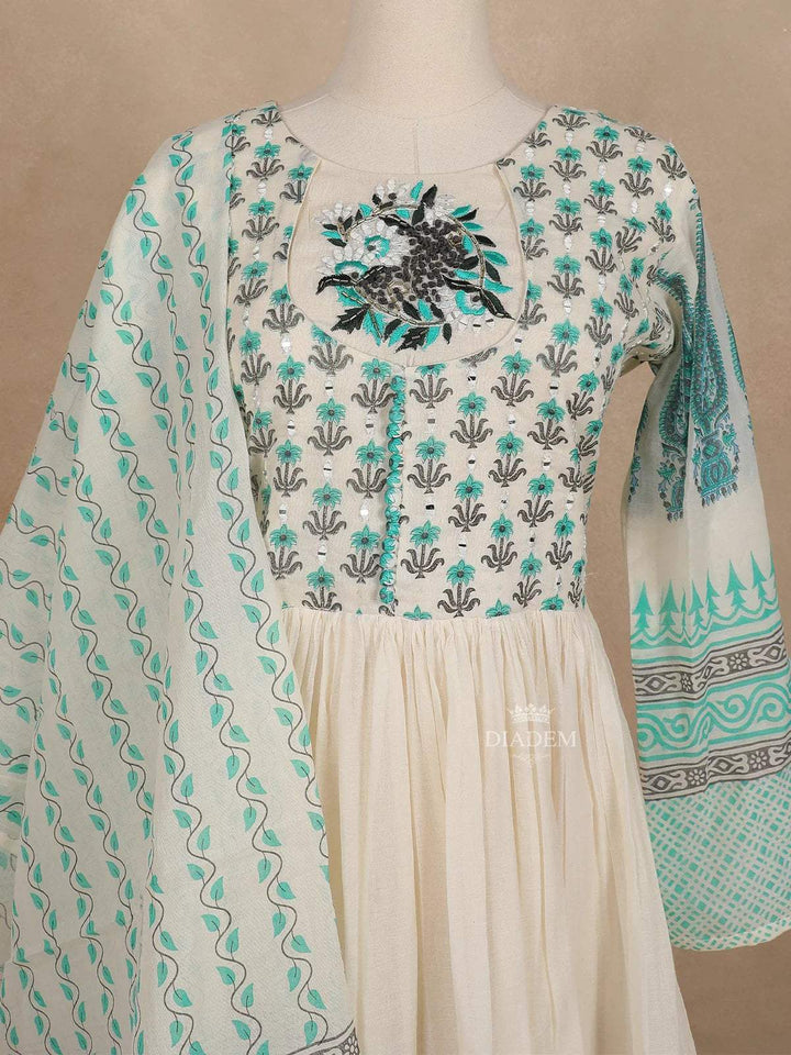 Off White Cotton Straight Cut Salwar Suit for Women Adorned with Sequins and Flower Designs Paired with Dupatta - Diadem