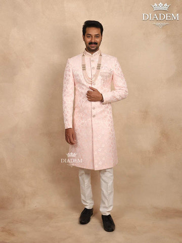 Light Pink Jacquard Sherwani Suit with Floral Emboss paired with Bead Mala - Diadem