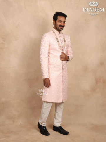 Light Pink Jacquard Sherwani Suit with Floral Emboss paired with Bead Mala - Diadem