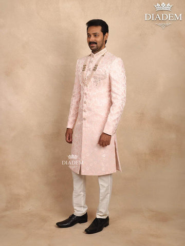 Light Pink Jacquard Sherwani Suit with Floral Emboss paired with Bead Mala - Diadem