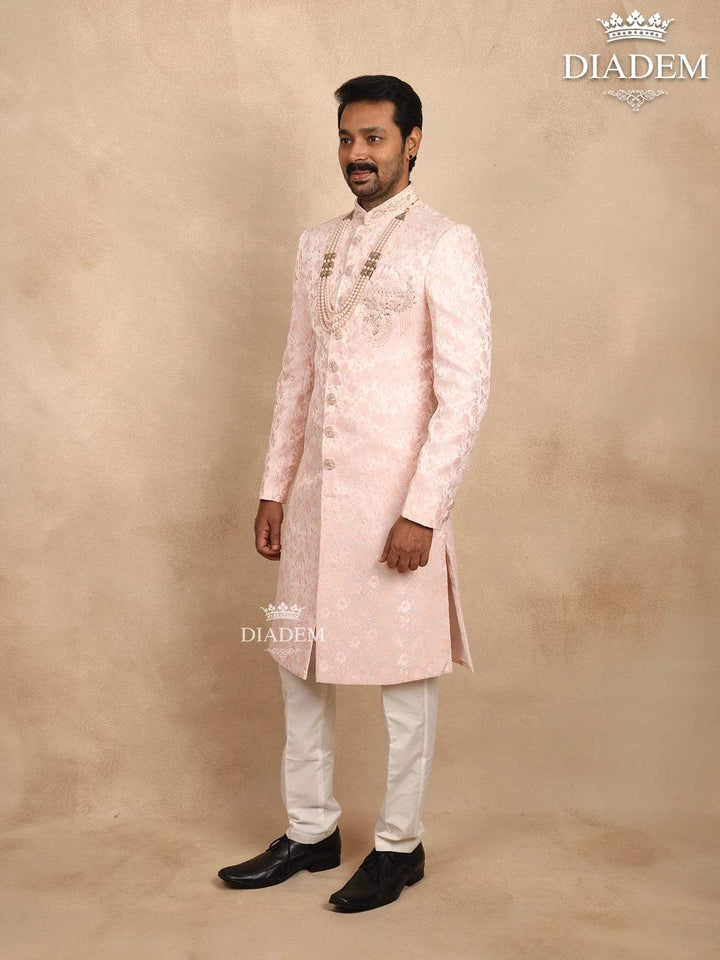 Light Pink Jacquard Sherwani Suit with Floral Emboss paired with Bead Mala - Diadem