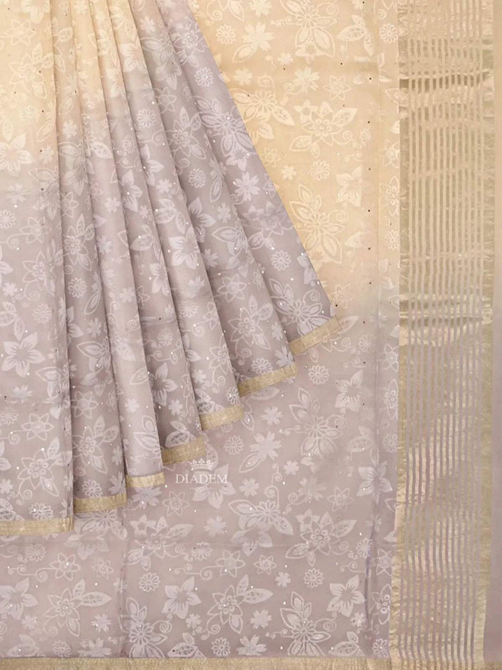 Beige Organza Silk Saree with Floral Prints on the body and Zari Border - Diadem