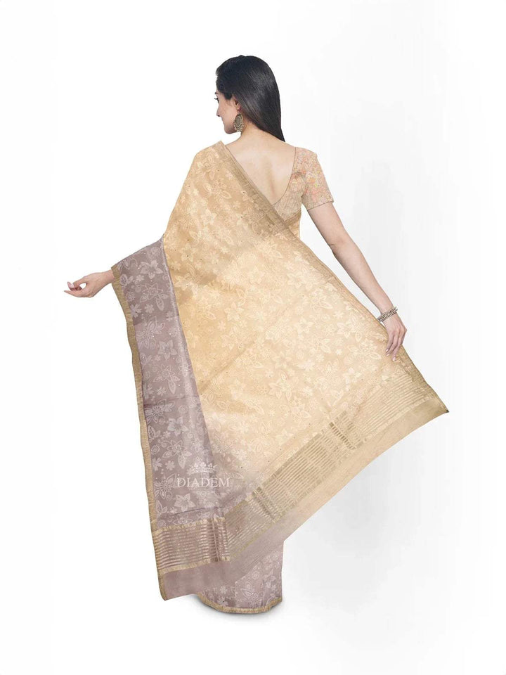 Beige Organza Silk Saree with Floral Prints on the body and Zari Border - Diadem