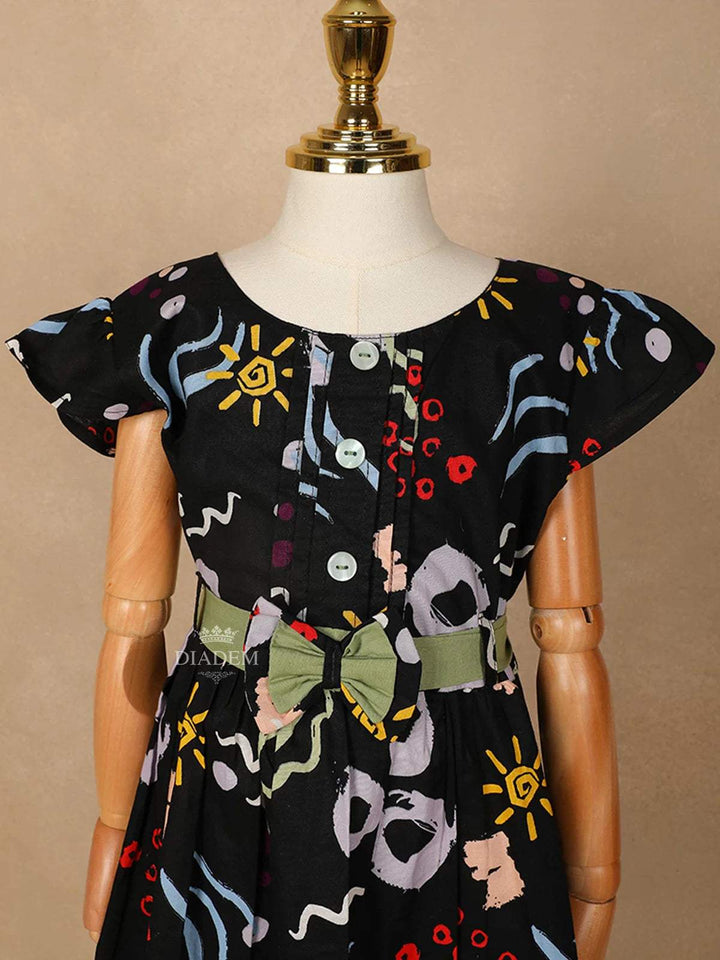 Black Cotton Frock Adorned with Prints and Attached Bow - Diadem