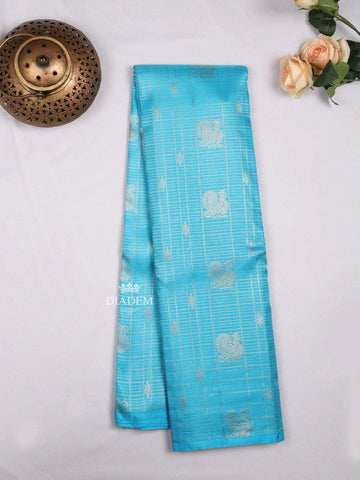 Sky Blue Pure Kanchipuram Bridal Silk Saree with Stripes and Peacock Motif on the body and Without Border - Diadem