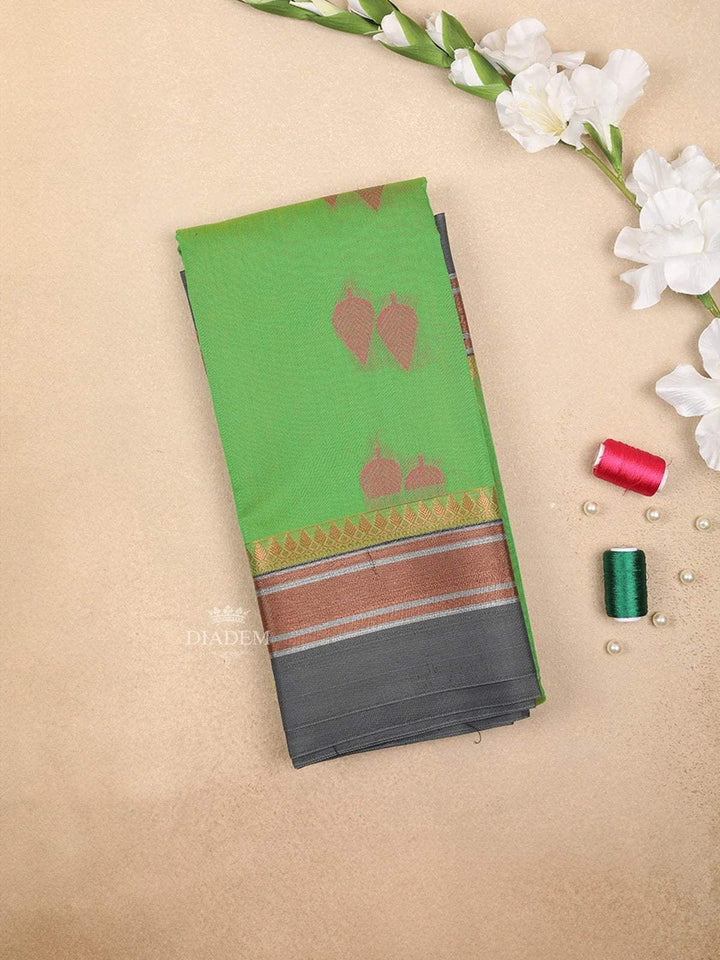 Green Silk Cotton Saree with Double Leaf Motif Design on the Body with Contrast Border - Diadem